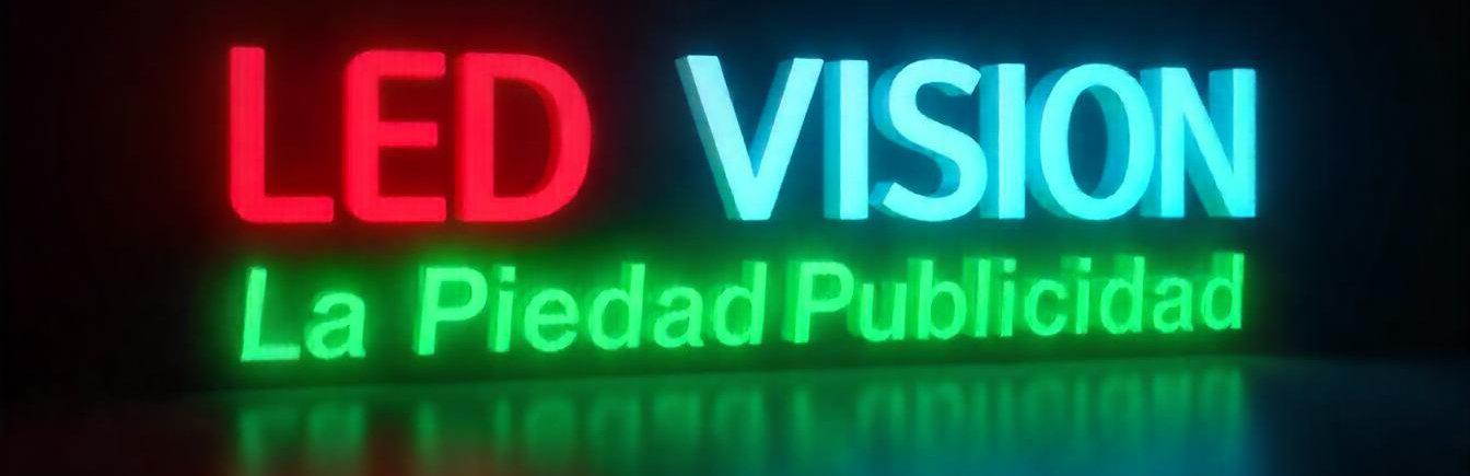 Logotipo LED VISION La Piedad Publicidad con letras iluminadas en rojo, azul y verde sobre fondo oscuro